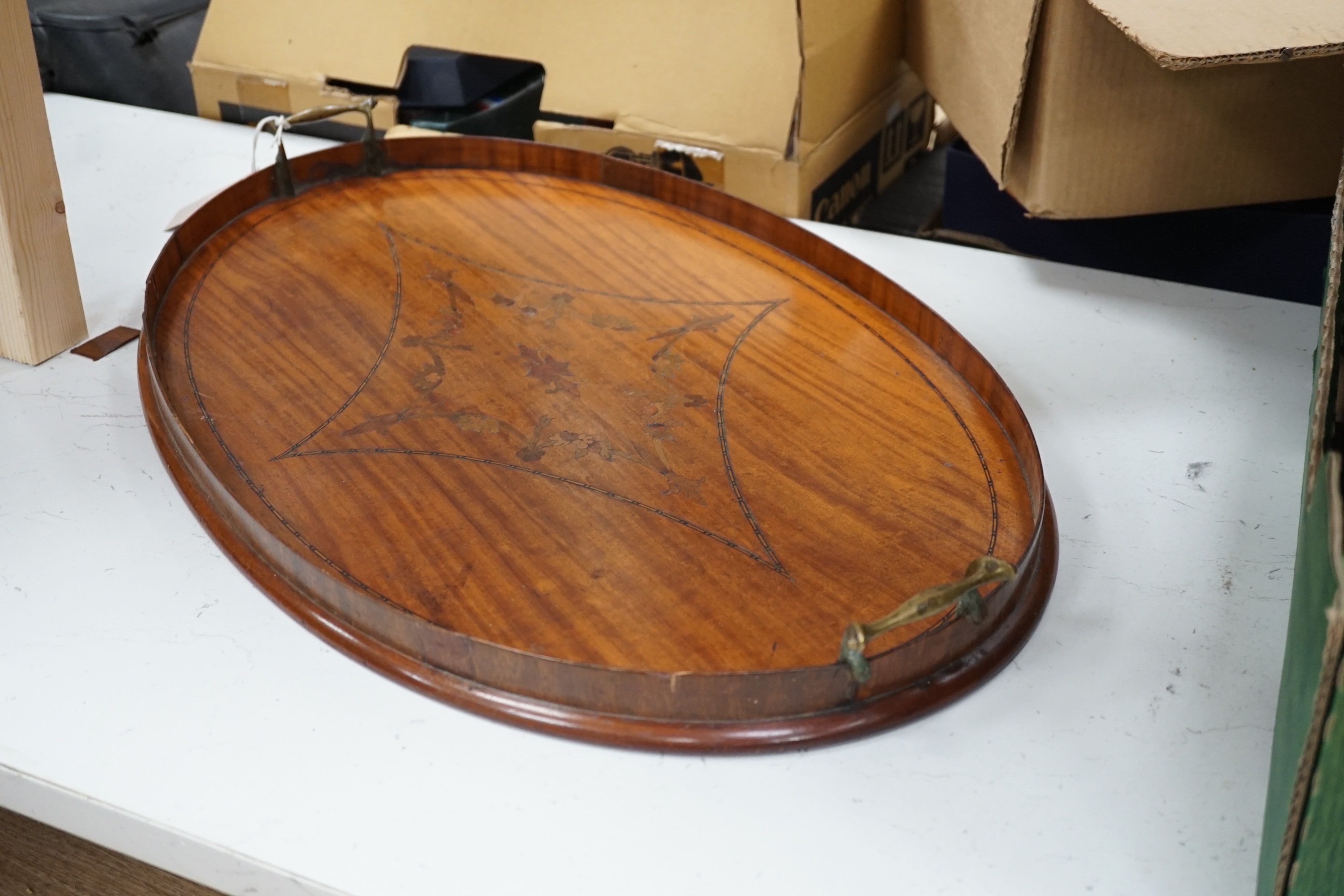 A large oval marquetry satinwood tray. 66cm wide